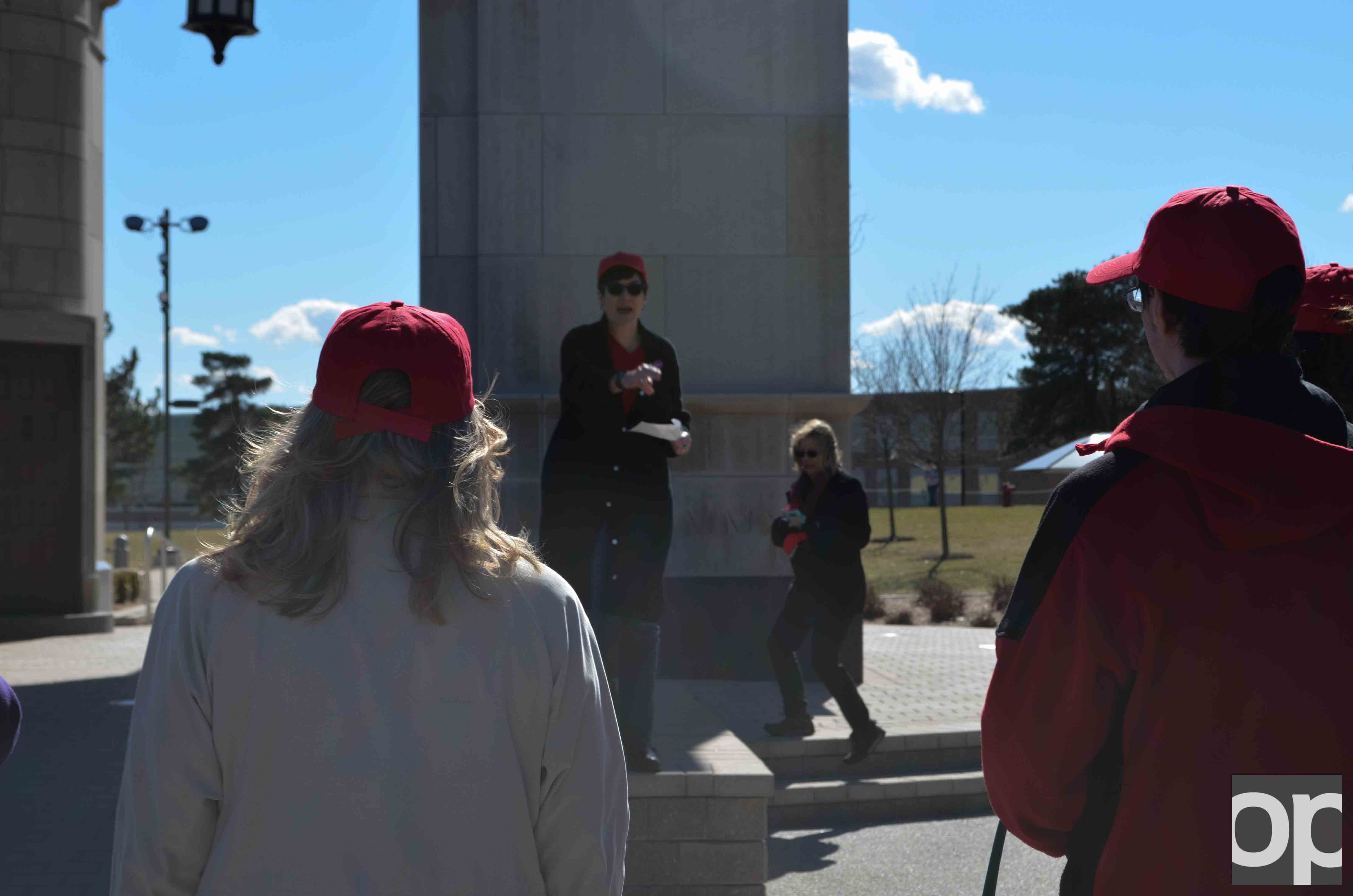 Students, faculty and staff come together wearing red