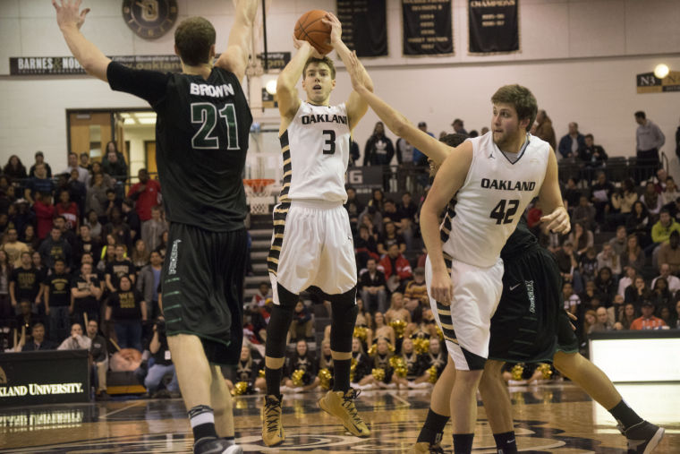 OU senior guard Travis Bader spots up in a game from earlier this year. Bader led the Golden Grizzlies with 33 points against the Penguins, 18 of which came from 3-point range.