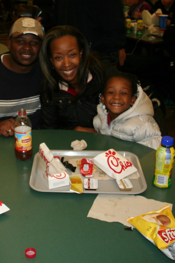 The Paige family drove 45 minutes north from Oak Park just for a taste of Chick-fil-A. “I love Chick-fil-A,” says Kimberly Paige, a Georgia native who was raised on the franchise’s food. The Post caught up with the family of three on their first successful commute to the Oakland University location. James Paige, Kimberly’s husband, planned on surprising his wife with a secret trip to Chick-fil-A this past Sweetest Day, but the holiday fell on a Saturday, so the location was closed.This setback didn’t discourage the family from making the trip again for the hard-to-find chicken. “I’m a strip man, and the fries are delicious,”Mr. Paige insisted shortly after finishing his meal. Mrs. Paige said she prefers the nuggets, with a few honey mustard packets on the side to dip with.Before departing on the long drive back to Oak Park, Mr. Paige made sure to take a few extra Chick-fil-A sauces home with him in his coat pocket, assuring us that they’d “most definitely” be back to the restaurant soon.