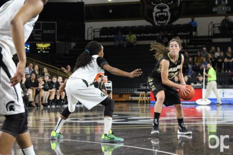 Taylor Gleason looks to pass the ball. Gleason recorded 11 points in the game.