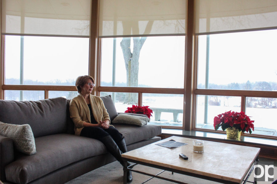 Dr. Allison Hynd sits in the living room of the Sunset Terrace. President George Hynd and his wife moved in to their new home on campus in early November.
