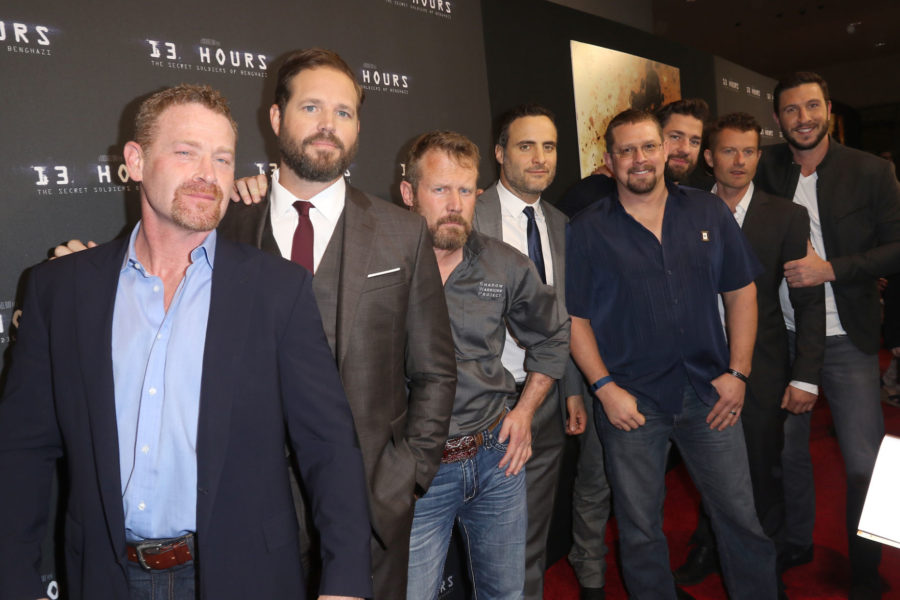 AVENTURA, FL - JANUARY 07: (L-R) Max Martini, David Denman, Co-author of 13 Hours Mark Oz Geist, Dominic Fumusa, Co-author of 13 Hours John Tig Tiegen, John Krasinski, James Badge Dale and Pablo Schreiber attend the Miami Fan Screening of the Pramount Pictures film 13 Hours at the AMC Aventura on January 7, 2016 in Miami, Florida. (Photo by John Parra/Getty Images for Paramount Pictures)