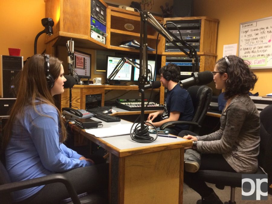 Contestant, Emily Farnam, sits in-studio with Dating Game hosts, Erin Ben-Moche and Anthony Spak.