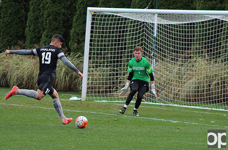 Austin Ricci takes a shot at the goal. Oakland lost to MSU 2-0 on Wednesday, Oct. 28.