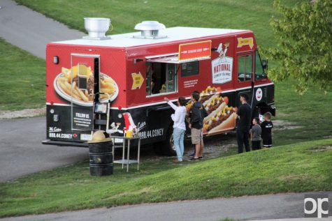 National Coney Island food truck serves customers at the men's soccer game against Michigan State University on Wednesday, Sep. 14, 2016. 