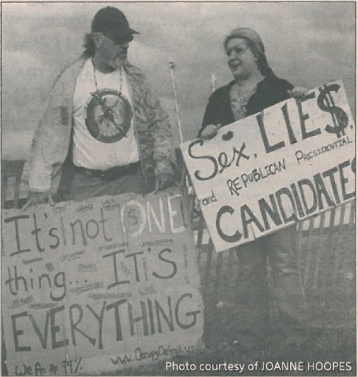 A father and daughter protested the GOP debate held on Oaklands campus. 