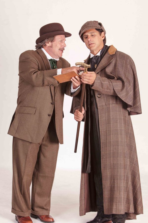 Phil Powers as Dr. Watson (left) and Ron Williams as Sherlock Holmes (right).