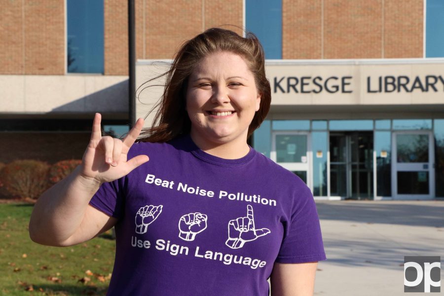 Jenna Varosi-Garavaglia, a former Oakland University student who has lost 95% of her hearing, is now a teaching as an assistant for an American Sign Language professor.