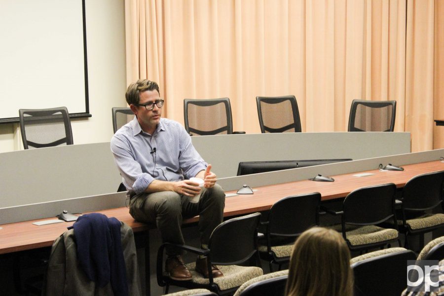 John Stoll of The Wall Street Journal speaks to a crowd on Wednesday, Oct. 26 at Elliott Hall.