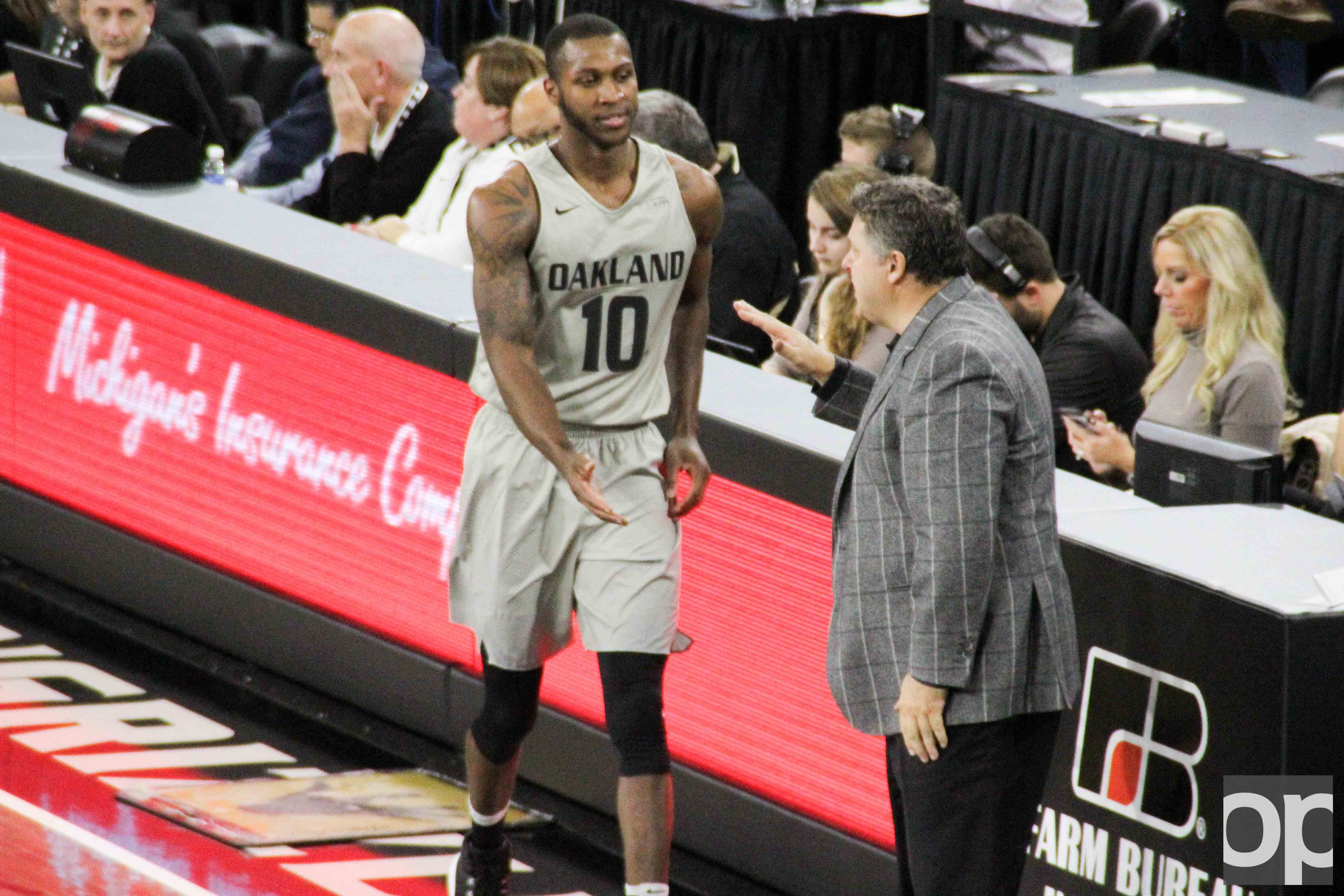 Isaiah Brock greets Head Coach Greg Kampe after checking out of the game against Chicago State on Saturday, Nov. 19, 2016.