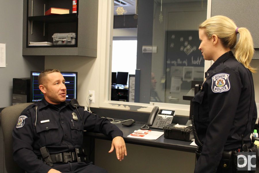 Officer Dwayne Rodriguez​ (left) and Lieutenant Nicole Thompson (right) chat inside the Police and Support Services building. 