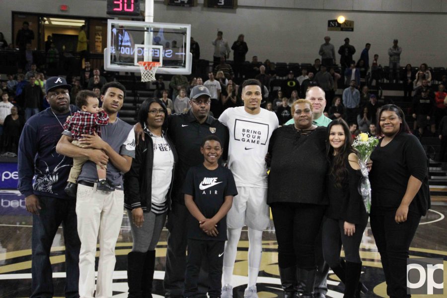 As part of the Senior Night celebration, Sherron Dorsey-Walker and his family were invited onto the Blacktop at the Orena before the game. 