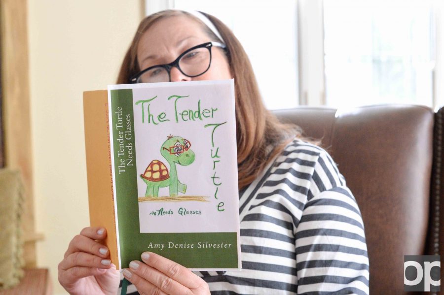 Oakland University 96 graduate Amy Silvester gets “The Tender Turtle short story series published. (Disclaimer: She is not the woman in the photo)
