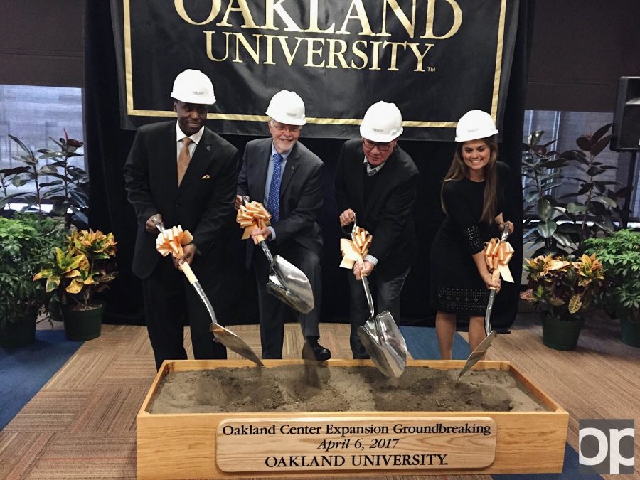 (Left to right): Vice President for Student Affairs Glenn McIntosh, President George Hynd, Vice Chair of the Board of Trustees W. David Tull and former OUSC President and 2014 Graduate Samantha Wolf break ground for the Oakland Center expansion. 