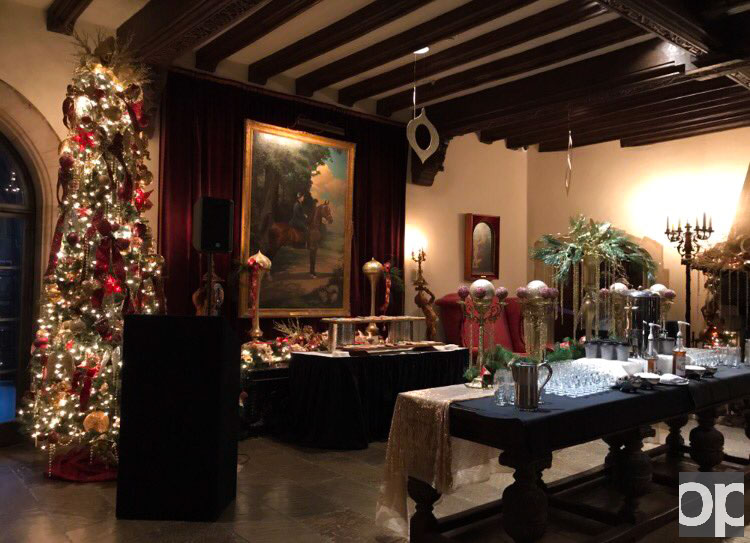 Meadow Brook is decorated with burgundy trees and Christmas decorations.