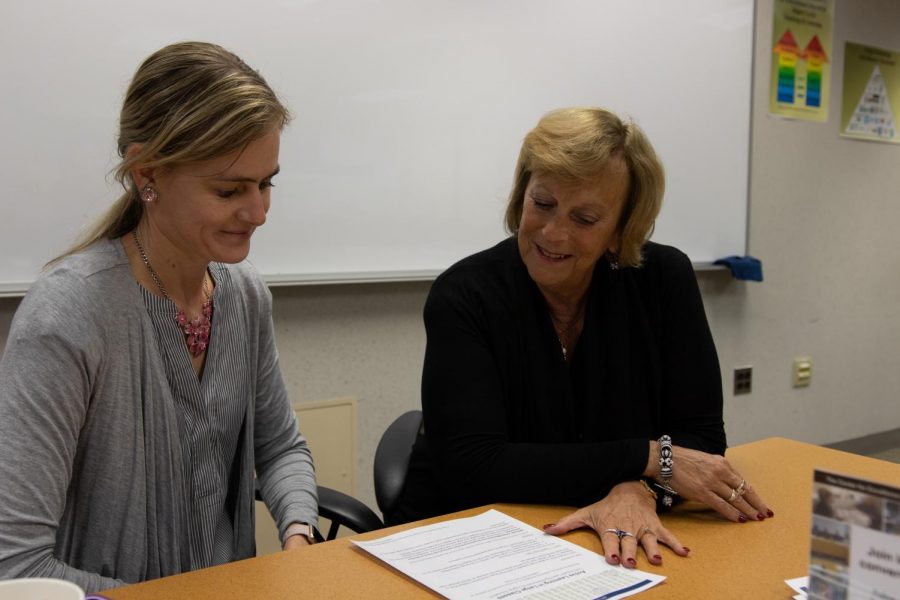 CETL Director Dr. Judith Ableser, right, works with Dr. Kathy Schaefer at a faculty meeting.