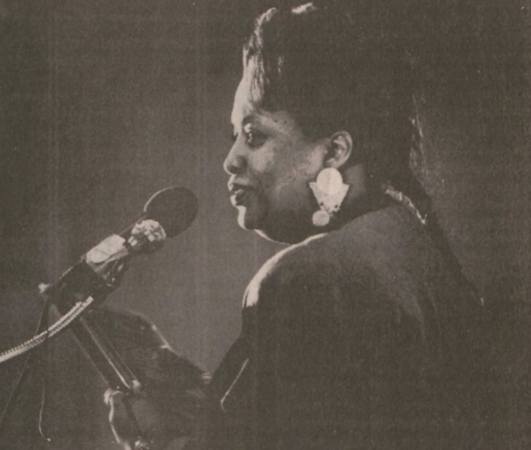 Jazz vocalist Ortheia Barnes accepts the 1989 Focus and Impact award at the Feb. 1 Black Awareness Month inauguration ceremony.