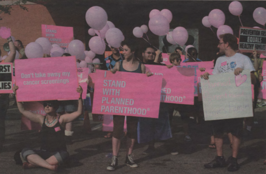 People gather on campus to support Planned Parenthood on campus in July 2011. The focus ranged from reproductive to general health care. 