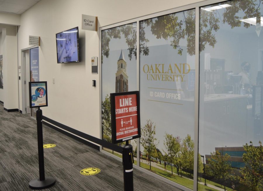 The ID card office is located on the main level of the Oakland Center. One visitor is allowed to enter at a time, right now. 