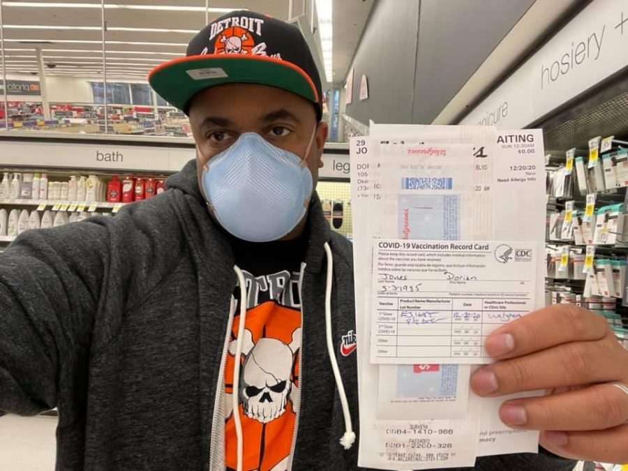 Jones holds the documentation from  the first round of his COVID-19 vaccination at a Walgreen’s store. He returned to the Walgreen’s for his second dosage Monday, Jan. 11. 
