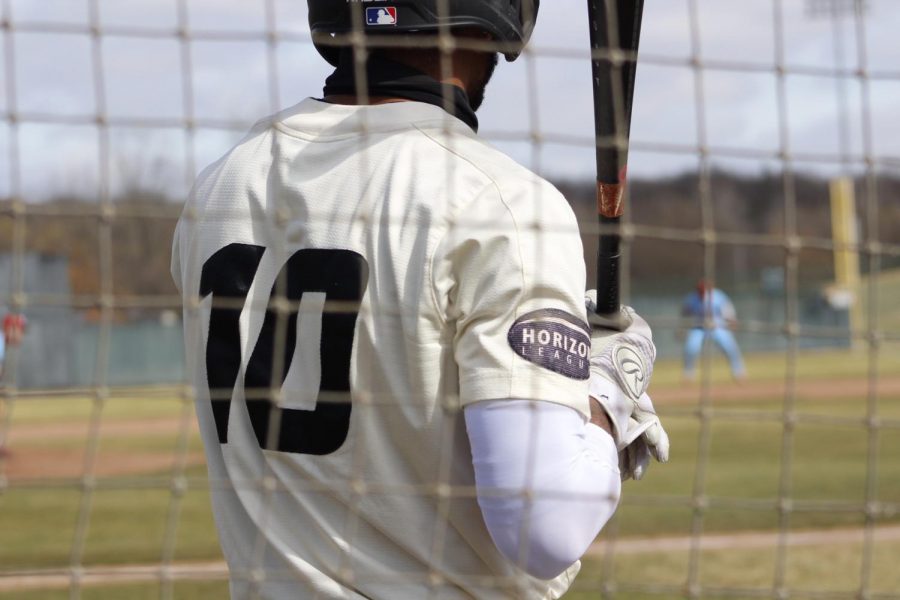 Lorenzo Elion waits for his at-bat. Oakland baseball was swept by UIC during their first homestand of the season.