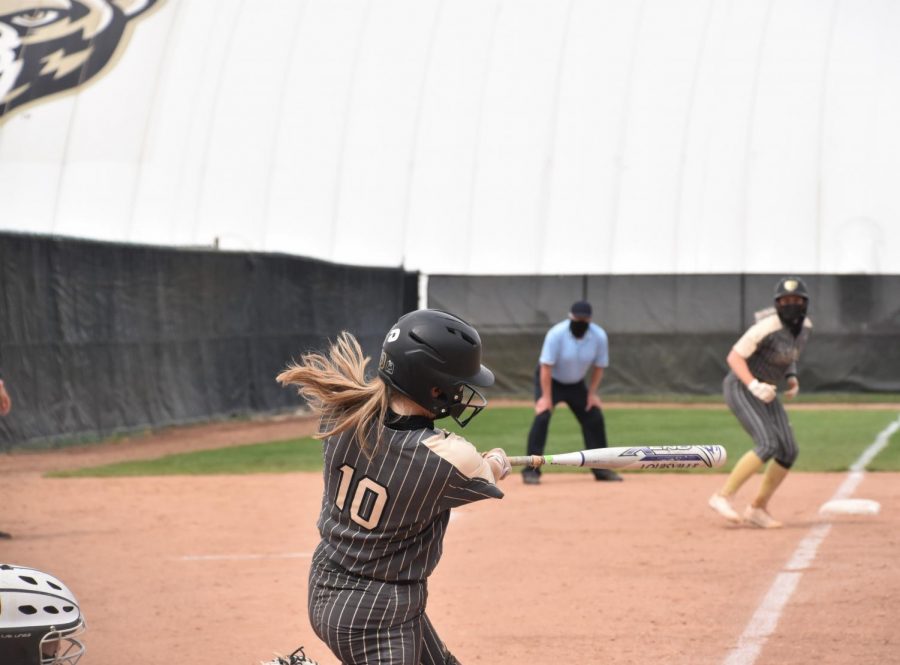 Jamie Squires squares up on a ball against Cleveland State. Squires set the OU record for RBIs with her grand slam.