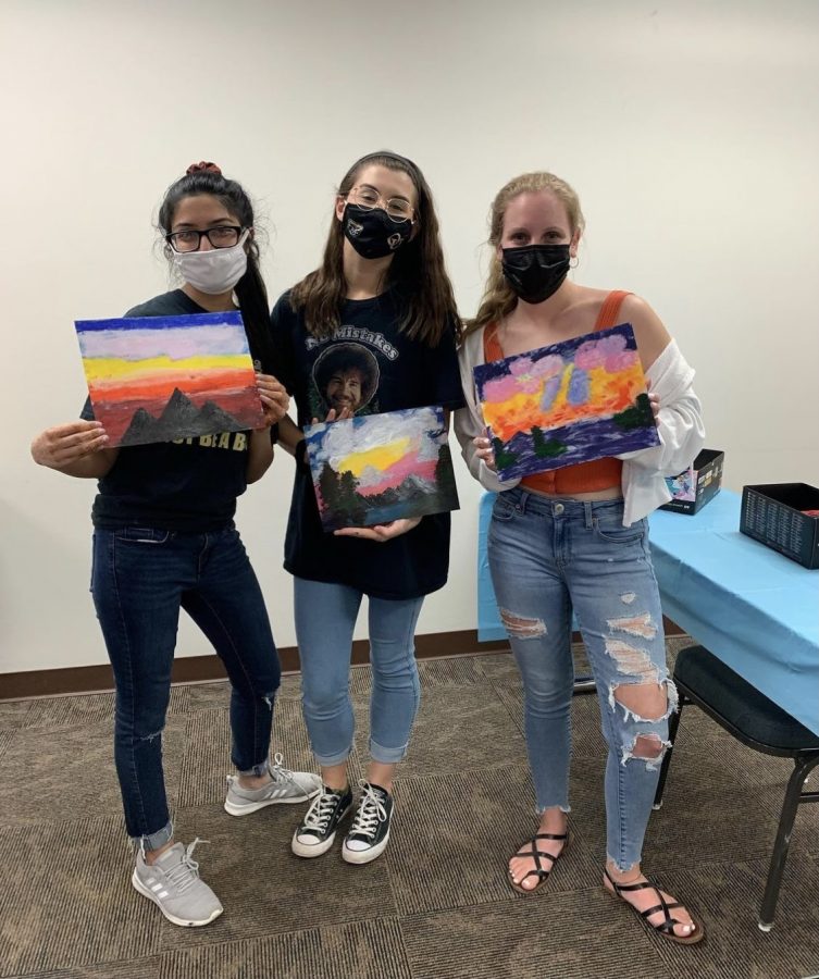 HOMES hosted a painting event called “Destress with Bob Ross” in the 
Oakland Center in April to relax before finals. Eboard members Pooja
Patel, Hannah Brendle and Meghan Savel proudly display their artwork. 