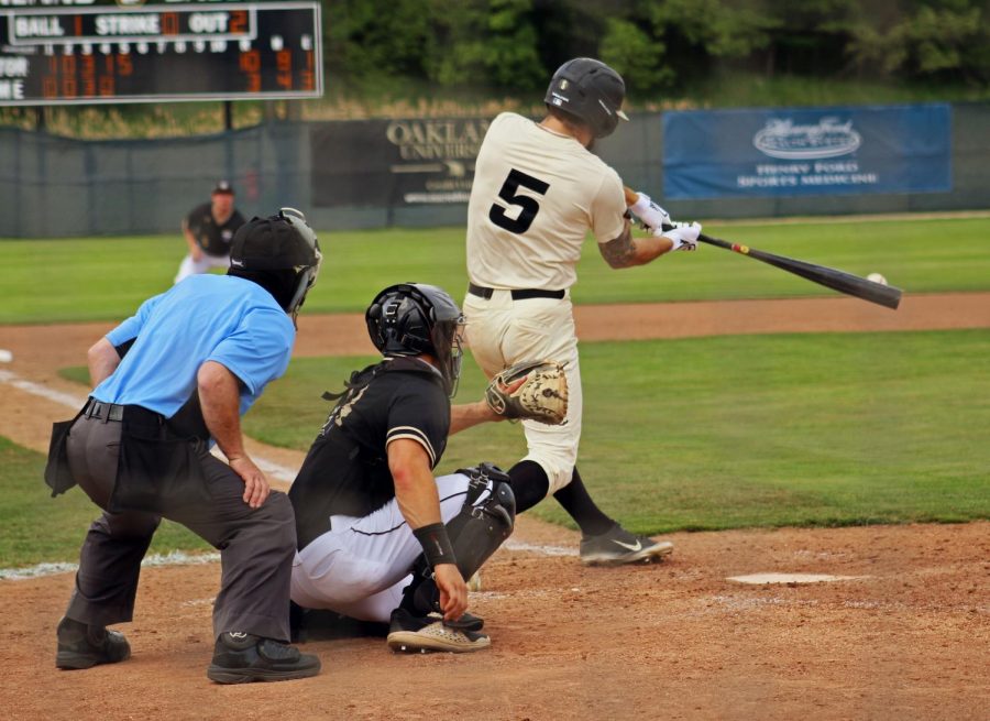 Cam Post puts bat on ball against the Purdue-Fort Wayne Mastodons. OU took the game and finished the season with a win.