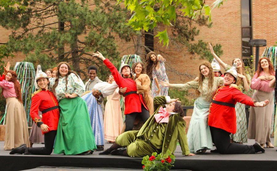 The cast of Patience, or Bunthornes Bride poses at the final scene. SMTD performed in the lawn of Varner Hall.