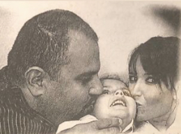 Gabrielle pictured with her loving parents, John and Anne-Marie.