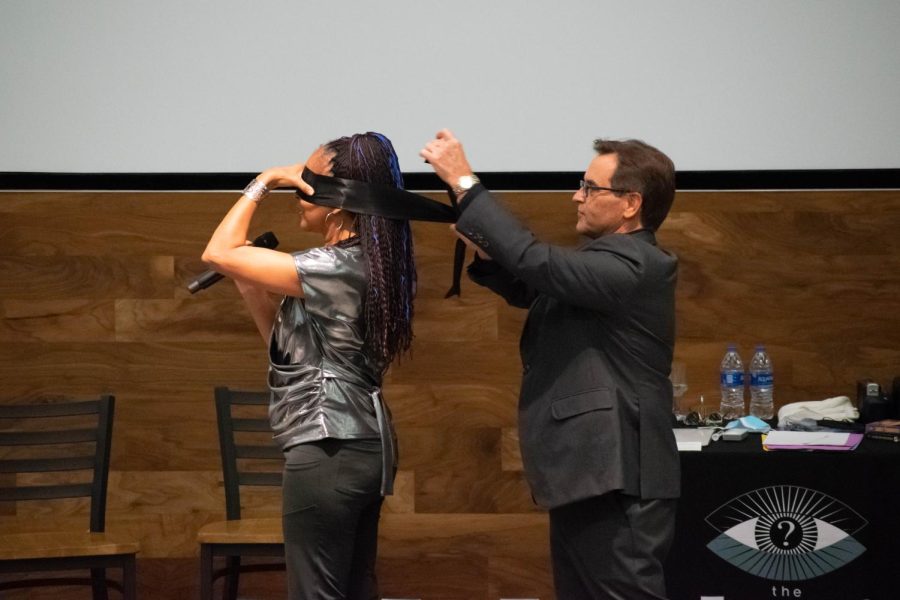 Jeff Evason blindfolds Tessa Evason at their performance in The Habitat last week.