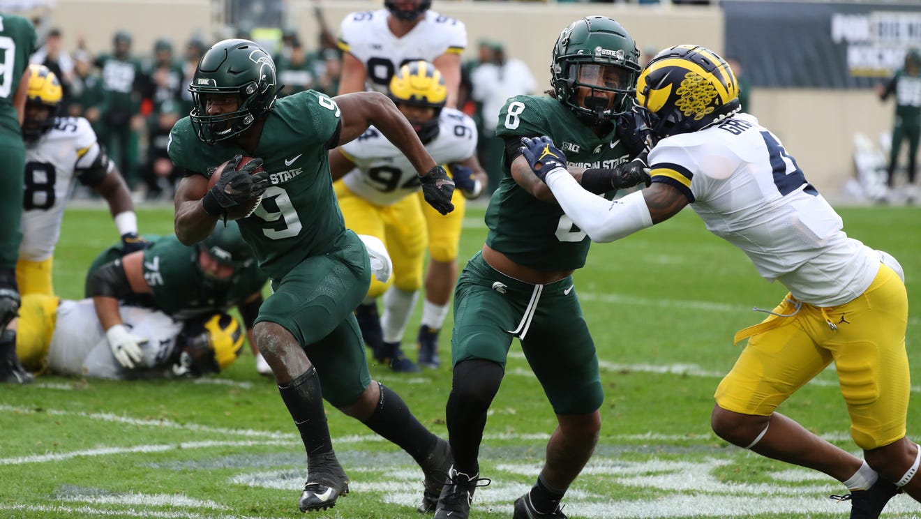 MSU s Kenneth Walker III dismantles rival U M in 37 33 victory