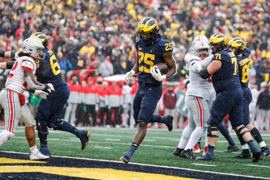 Michigan+running+back+Hassan+Haskins+%2825%29+scores+a+touchdown+against+Ohio+State+during+the+second+half+at+Michigan+Stadium+in+Ann+Arbor+on+Saturday%2C+Nov.+27%2C+2021.+Photo+courtesy+of+the+Detroit+Free+Press