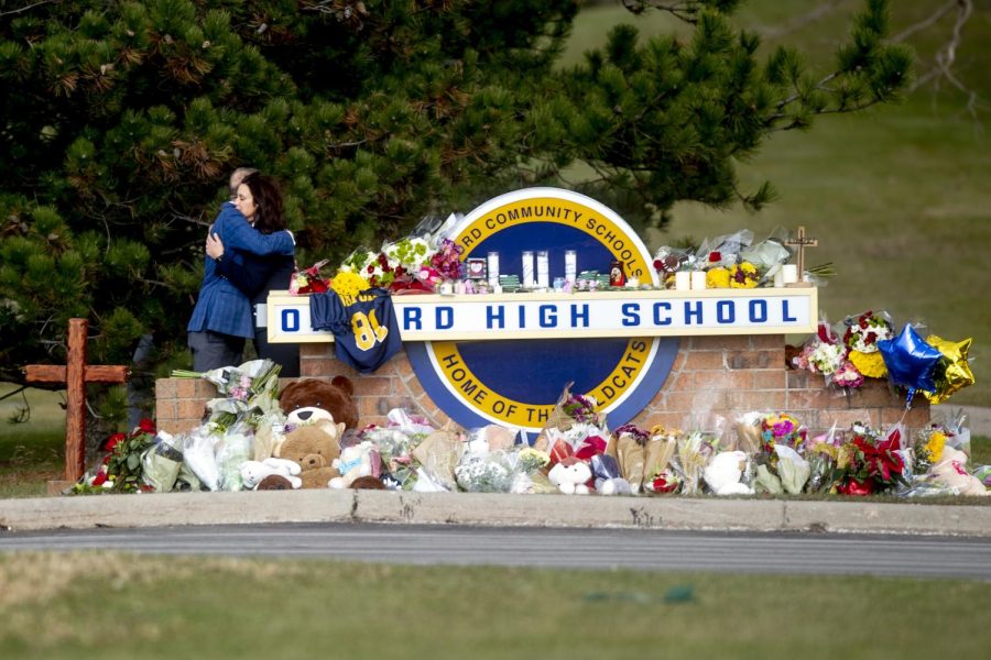 Governor Gretchen Whitmer paying her respects and honoring the victims at a memorial outside Oxford High School.