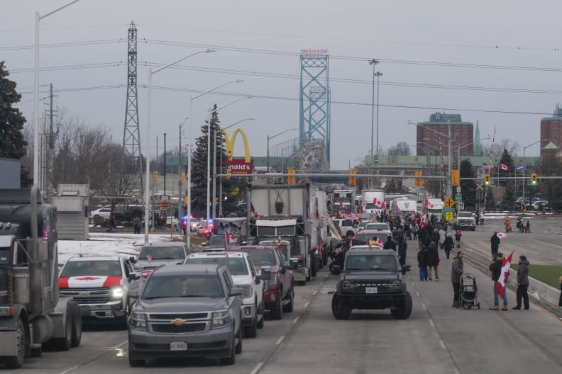 Protesters+against+vaccine+mandates+gathered+to+block+the+Ambassador+Bridge.+On+Friday+morning%2C+demonstrators+allowed+a+single+lane+to+open.+