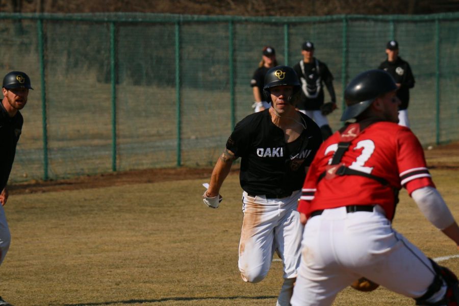 Cam Post when 3-4 with three runs scored in Oakland's 14-4 blowout victory over Rochester University on March 16.