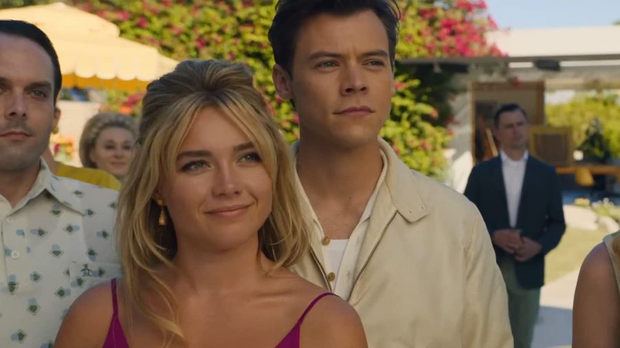 Florence Pugh (left) and Harry Styles (right) star in Olivia Wildes Dont Worry Darling, in theaters now.