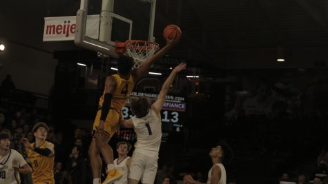 Townsend dunking during the Golden Grizzlies season opener against Defiance College on Nov. 7.