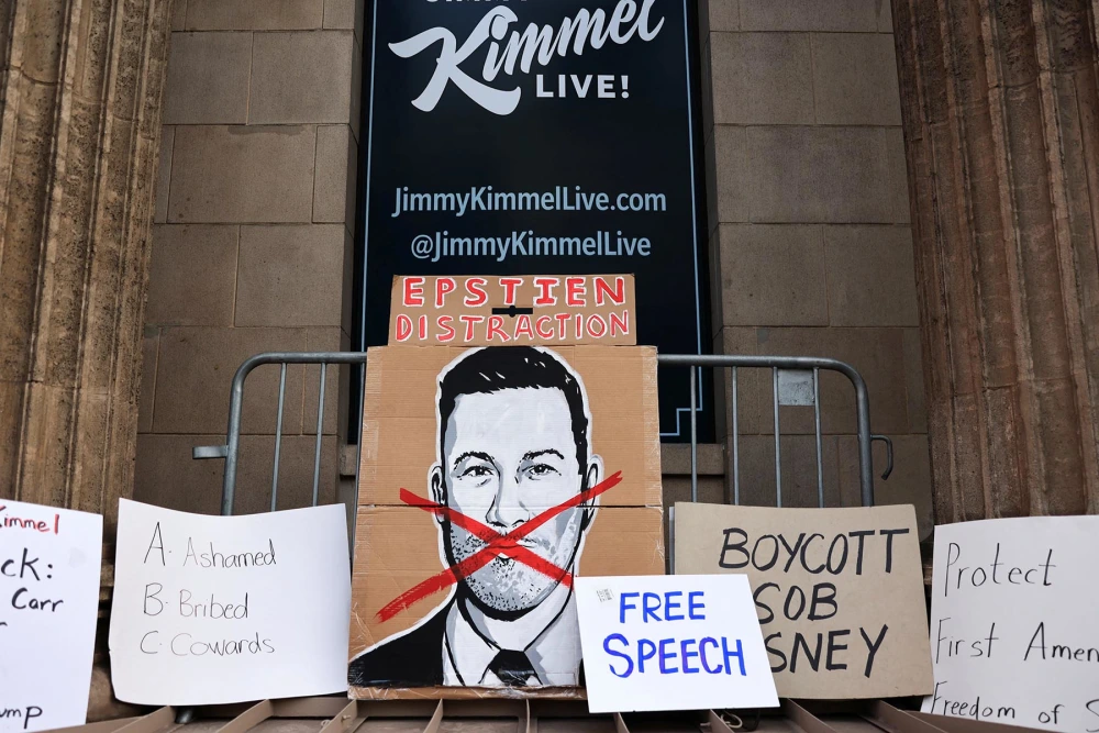 Signs and protests occurring outside of Jimmy Kimmel's Hollywood Studio, photo courtesy to Reuters